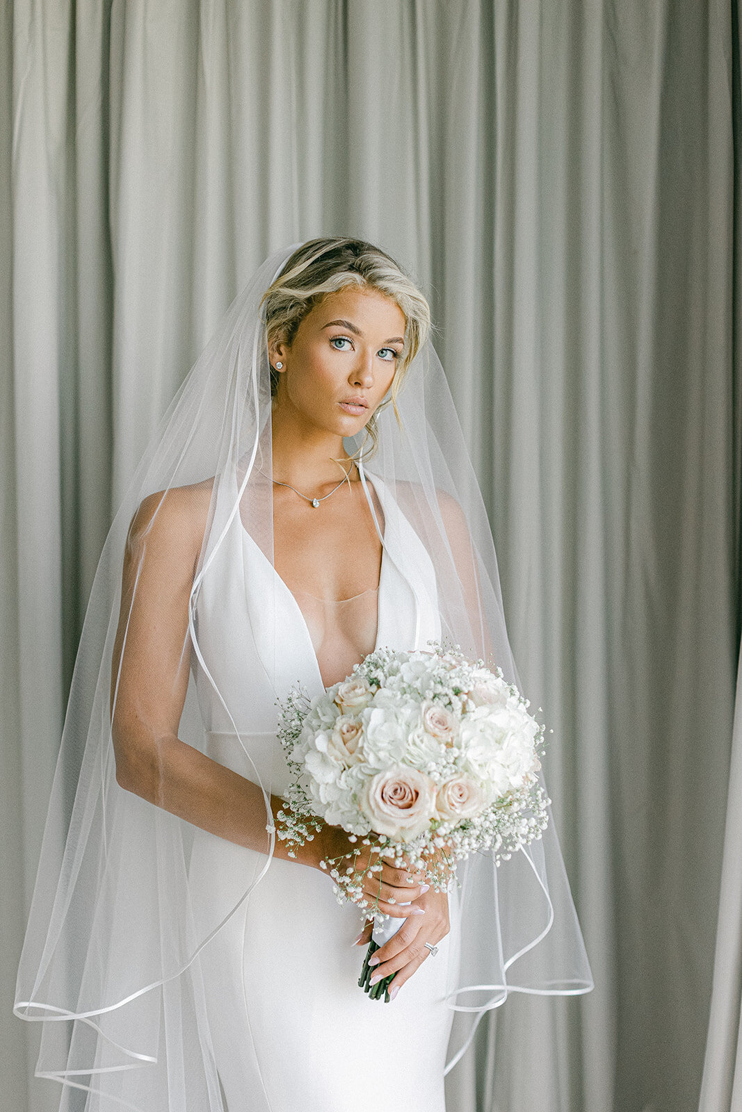 Meg Lee is a luxury Pittsburgh wedding photographer specializing in timeless, editorial, and heartfelt wedding photography for modern couples.