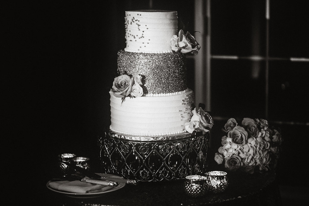 Wedding Photograph Of Cake Decorated With Roses Black And White Los Angeles