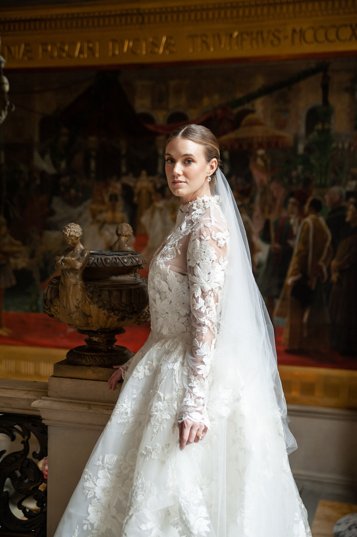 bride in a long sleeve lace wedding dress