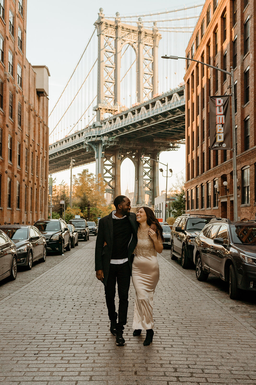 couple walking during engagement photos