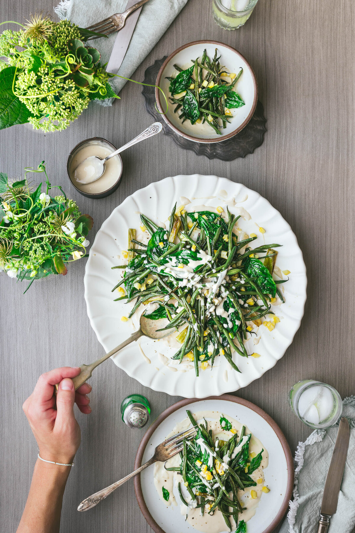 Tender fresh green beans roasted and served with preserved lemons and a lemony tahini dressing.