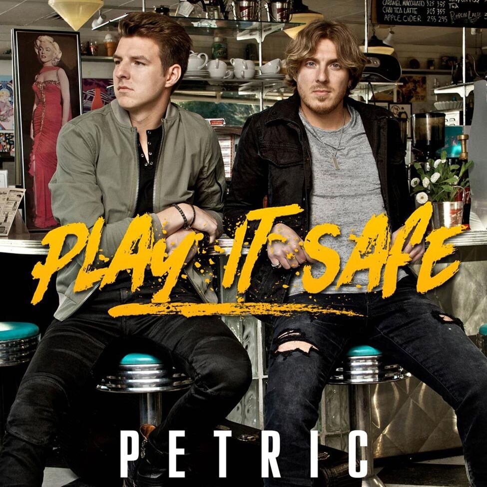 Single Cover Music Duo Petric Title Play It Safe both band members sitting on stools in retro diner