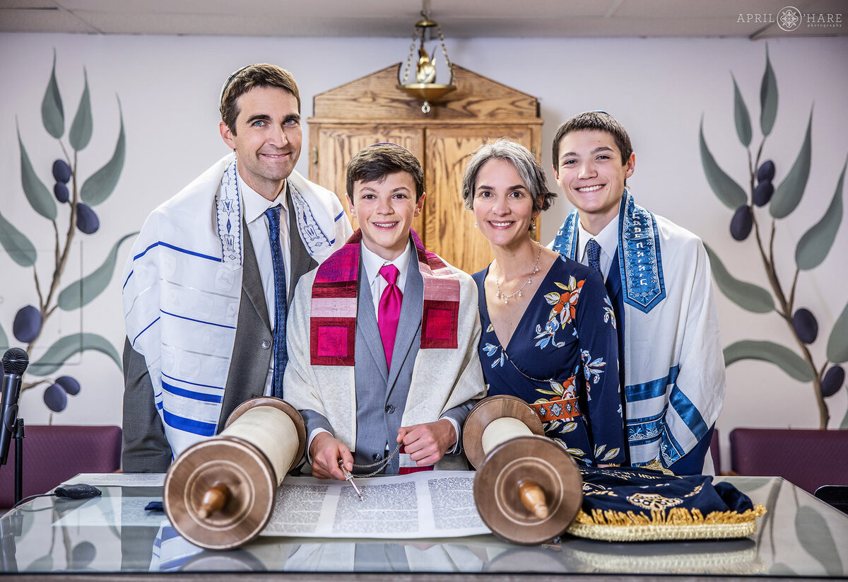 Classic Family Photo Gathered around the Torah at a Denver Bar mitzvah