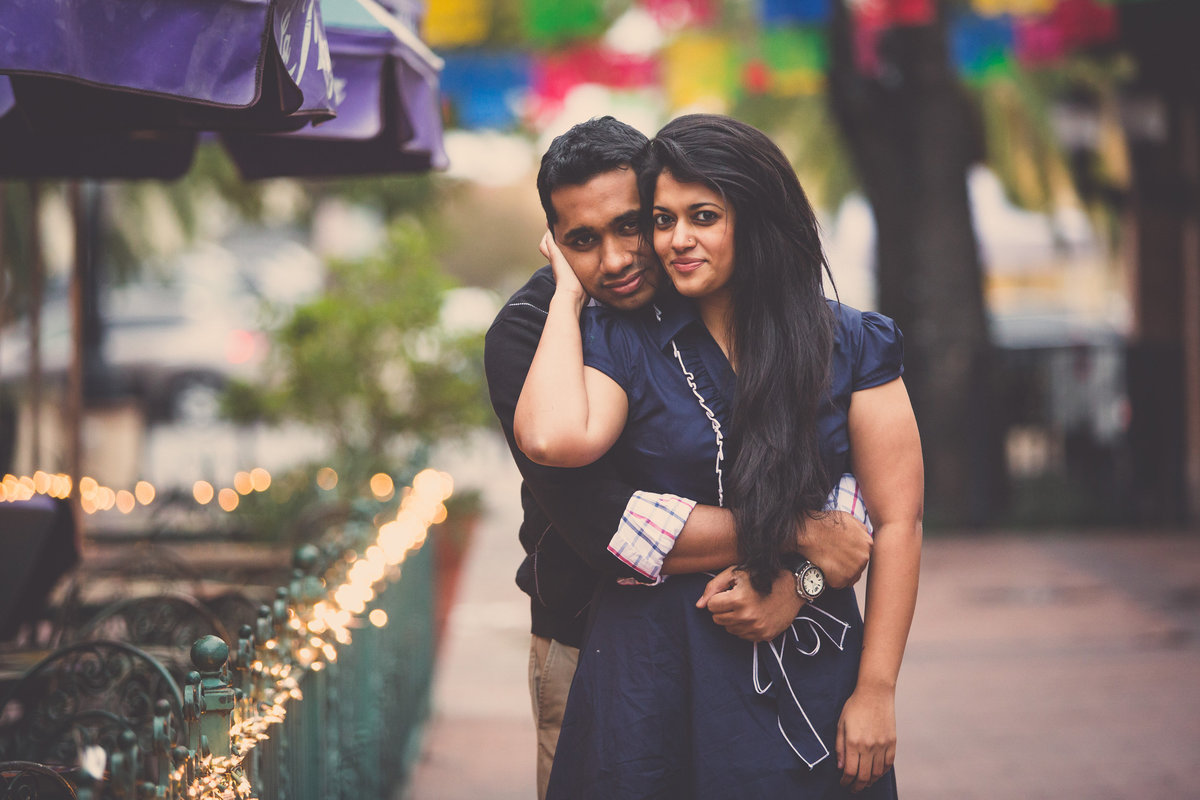 Engaged Indian couple holding each. Picture taken by San Antonio wedding photographer Expose The Heart Photography.