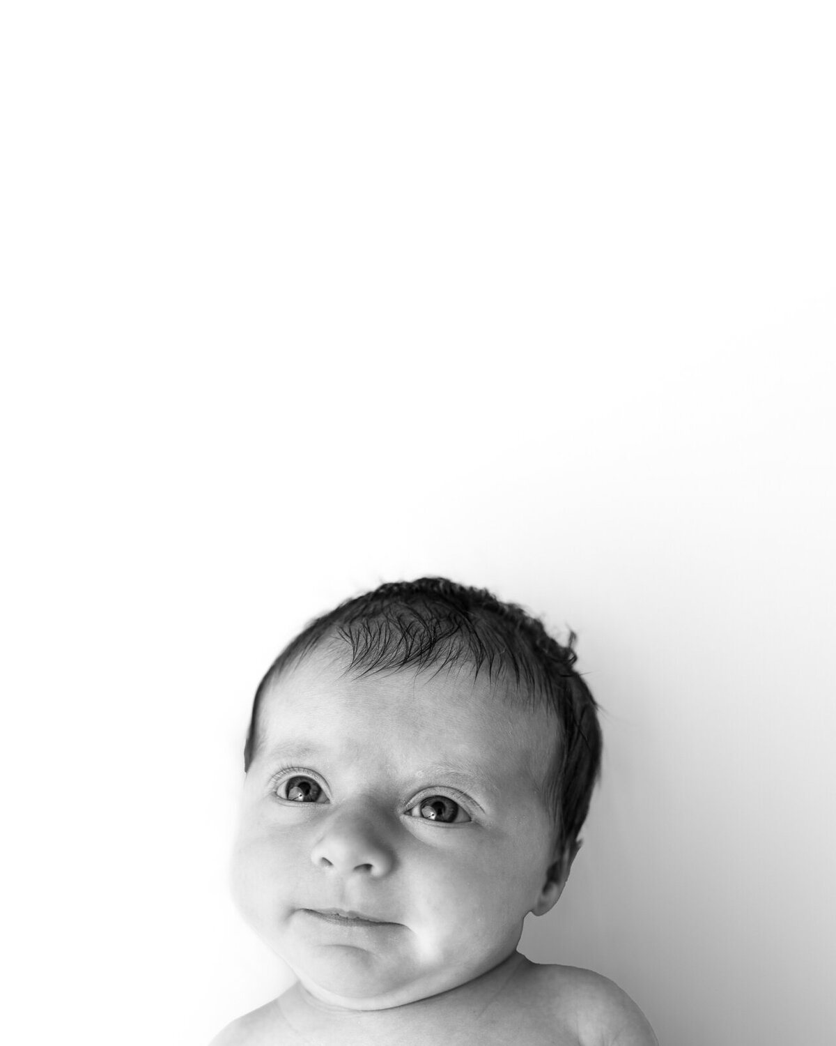 black and white newborn face headshot at st. louis newborn photoshoot