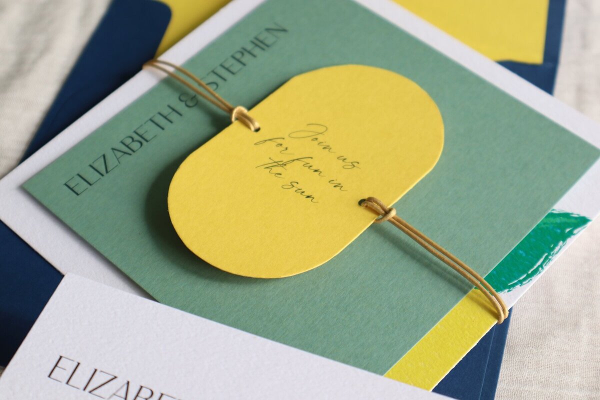 Wedding-invitations-with-yellow-tag