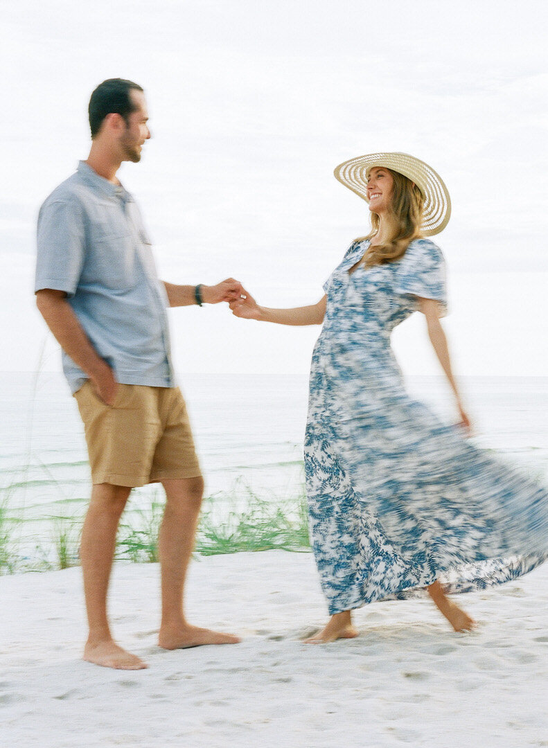 Couple Dancing on The Beach Motion Blur Photo