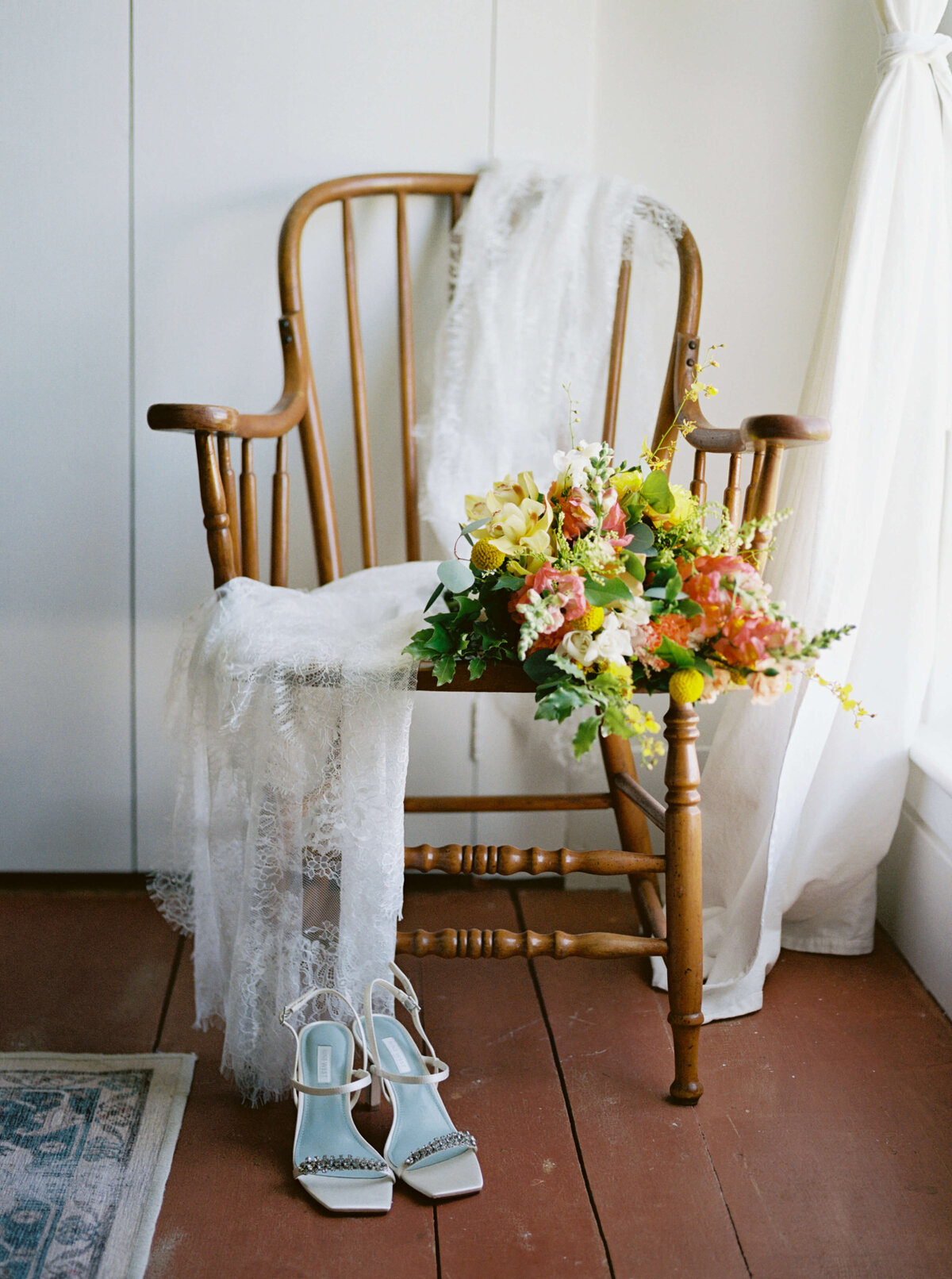 Chair with wedding shoes, veil and bouquet for  Woodburn Ridge Wedding, Nova Scotia