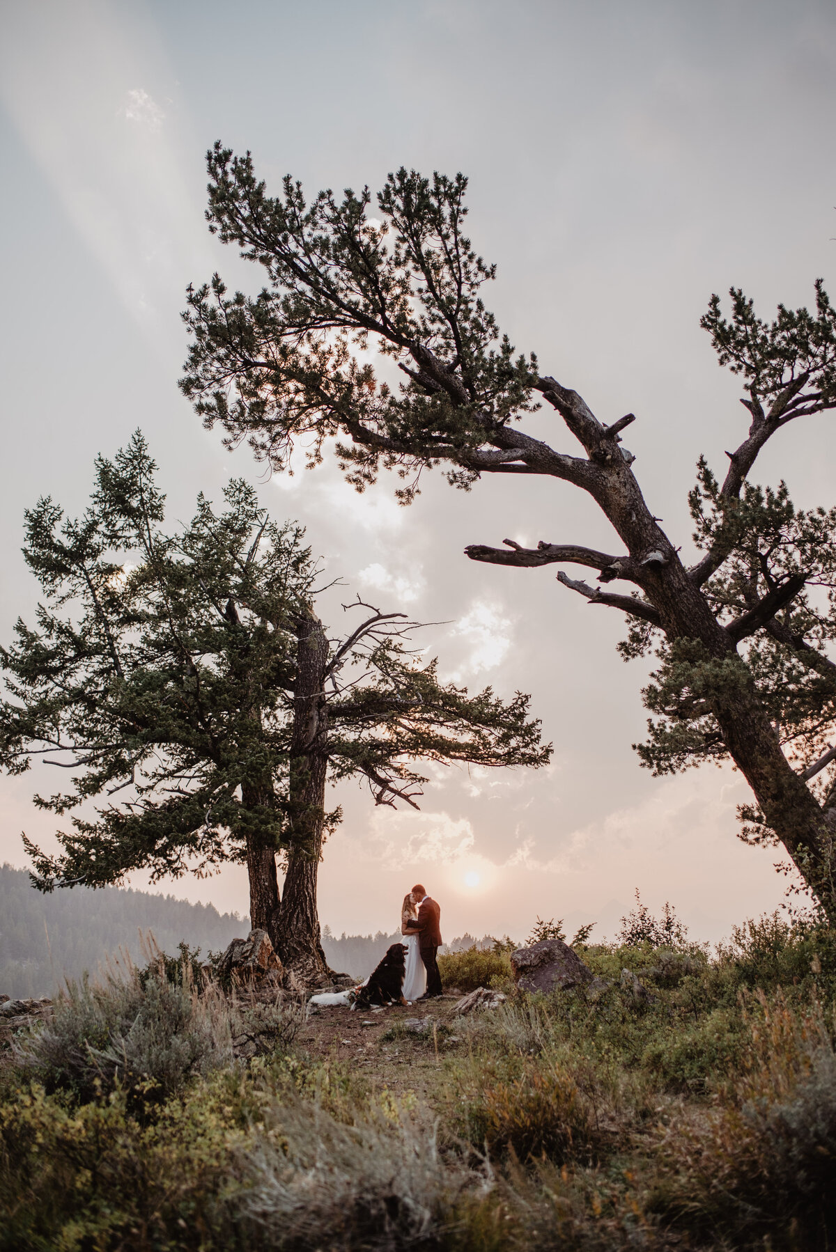 Jackson Hole Photographers capture couple watching sunset