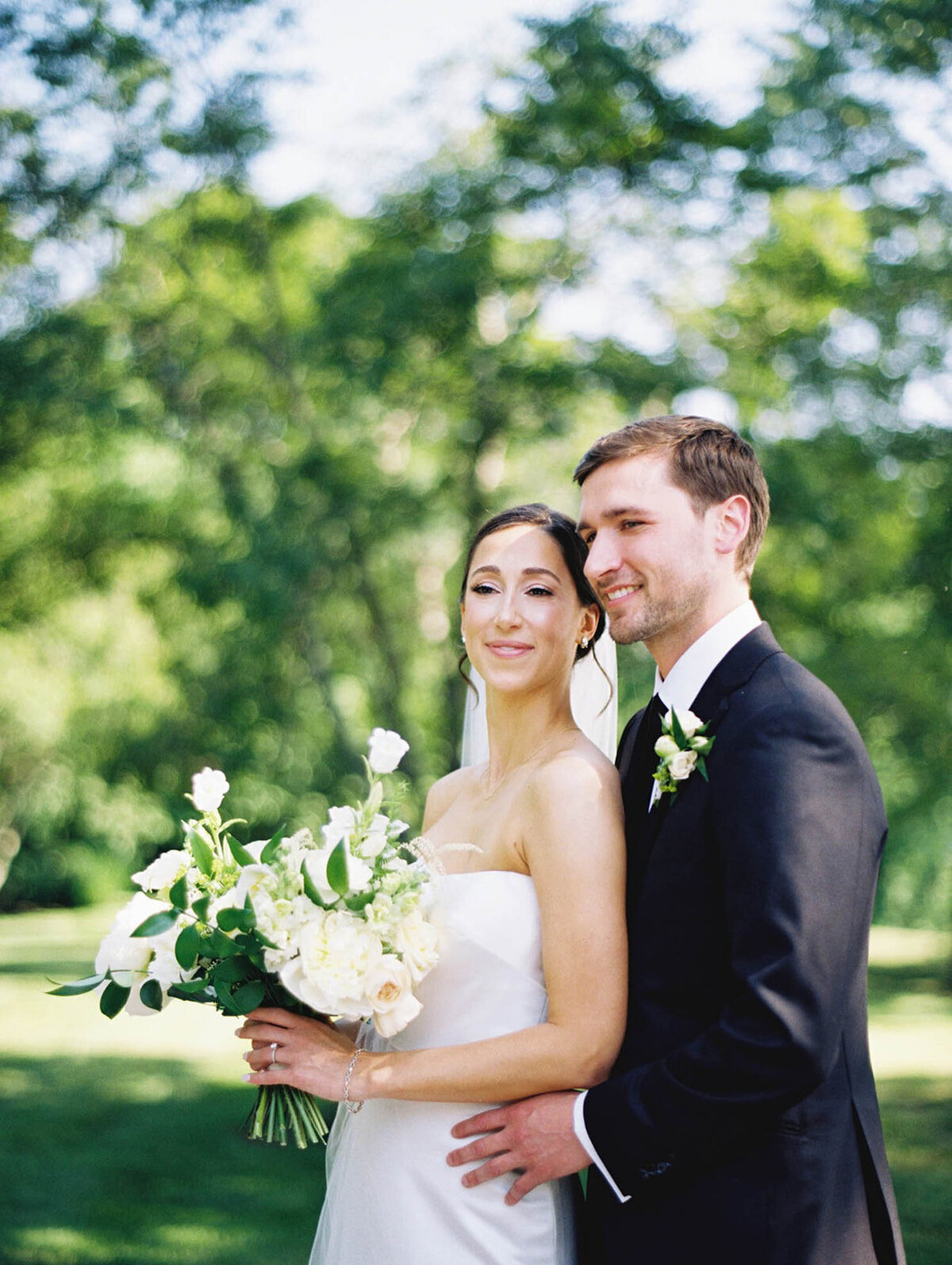 porttrait of bride and groom outdoors on a summer day
