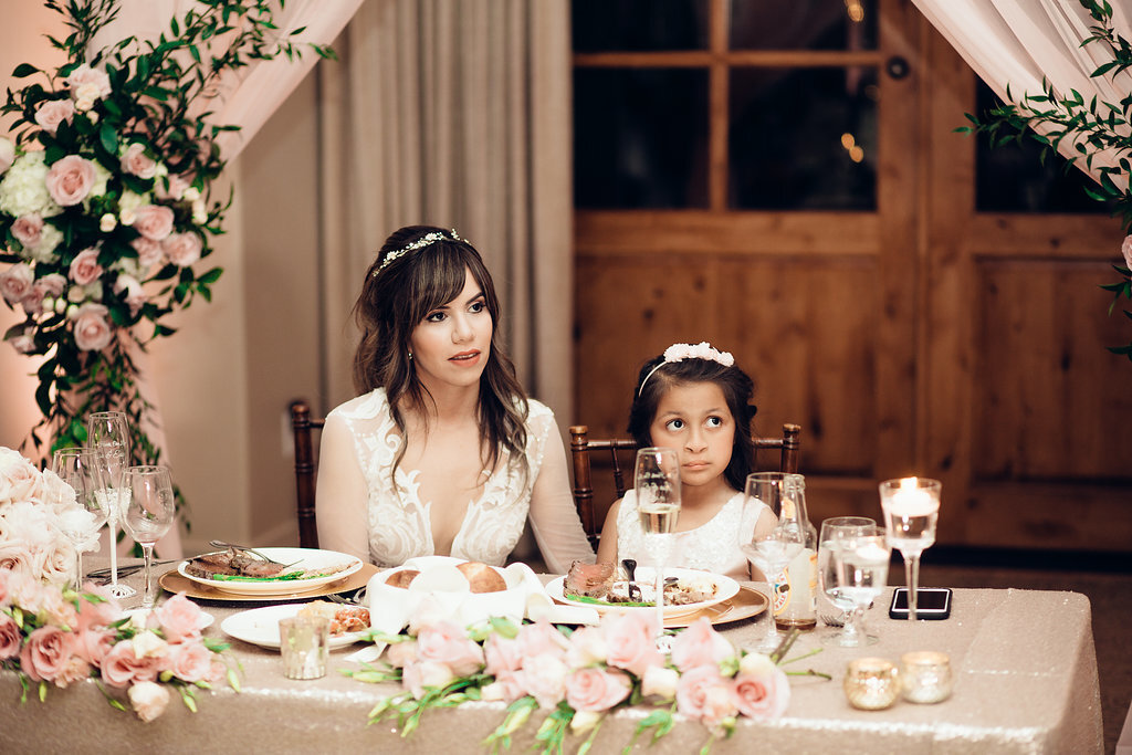 Wedding Photograph Of Bride And a Child Sitting Los Angeles