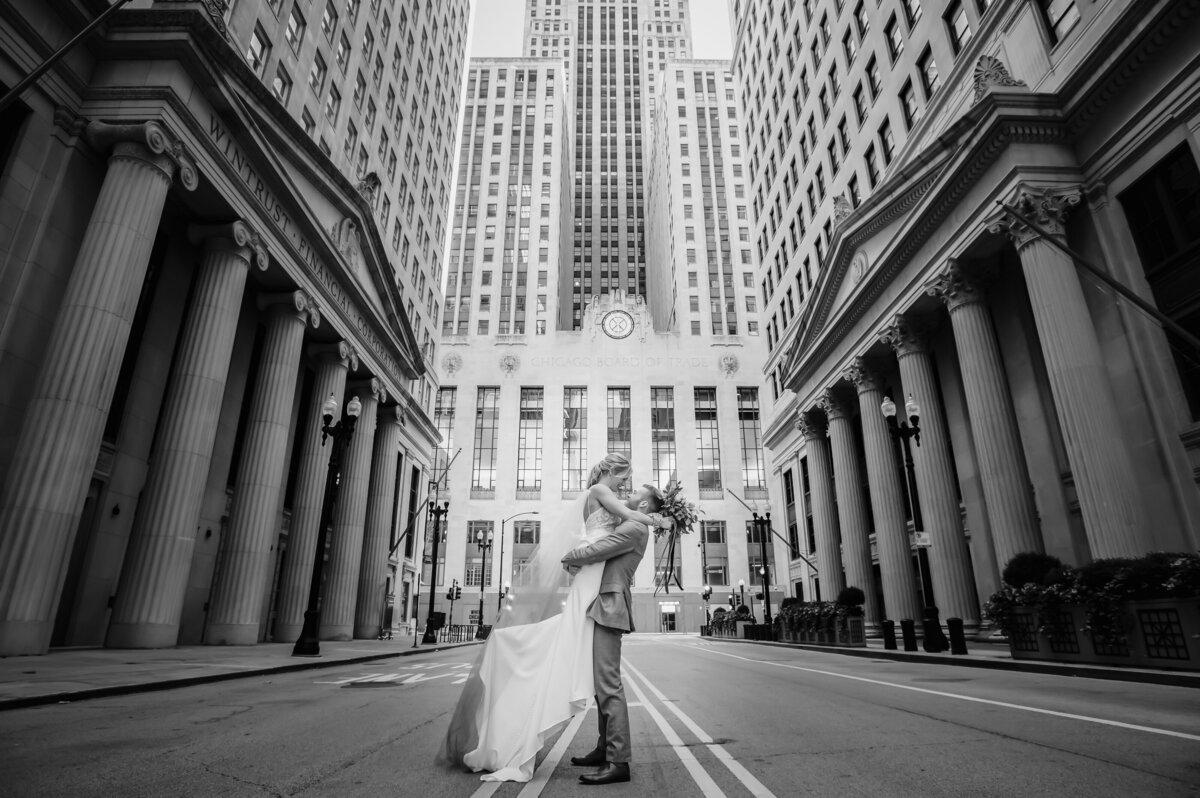 Bride and groom in front of the Chicago Board of Trade