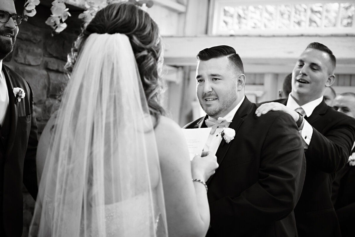 groom-candid-ceremony-emotional-NJ-07746