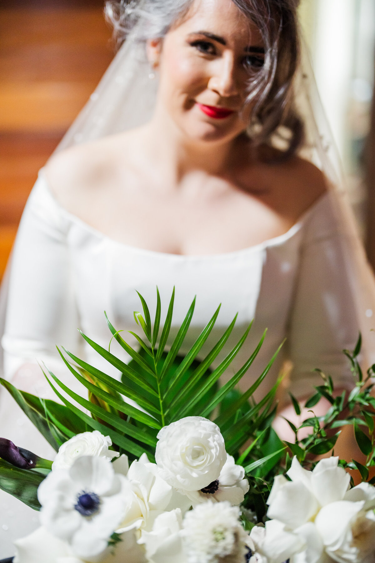 Bride on her wedding day with natural florals