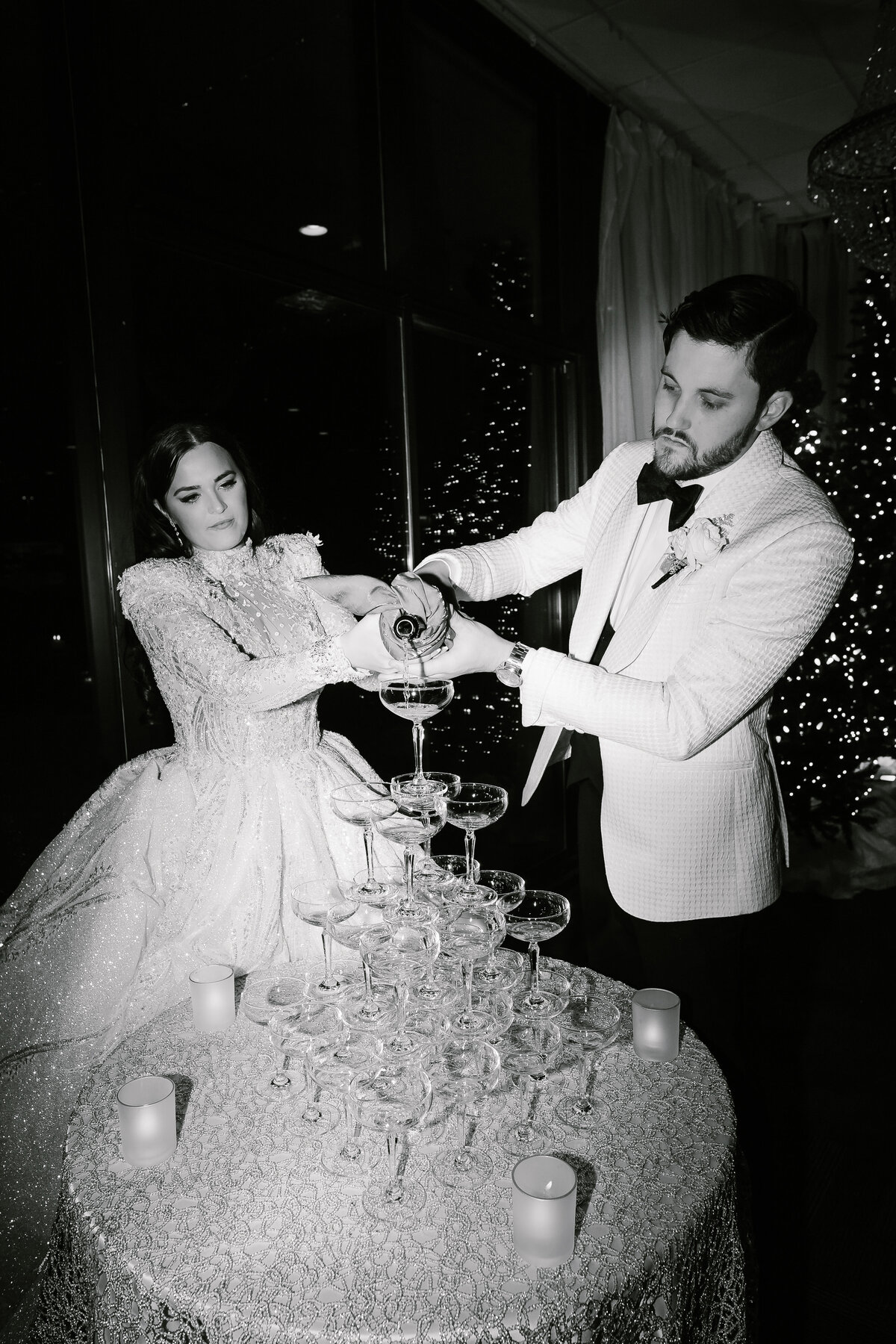 Couple pouring champagne