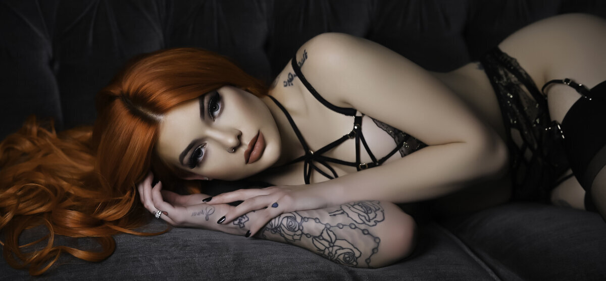 high-quality-boudoir-portrait-of-woman-with-tattoos-and-colored-hair