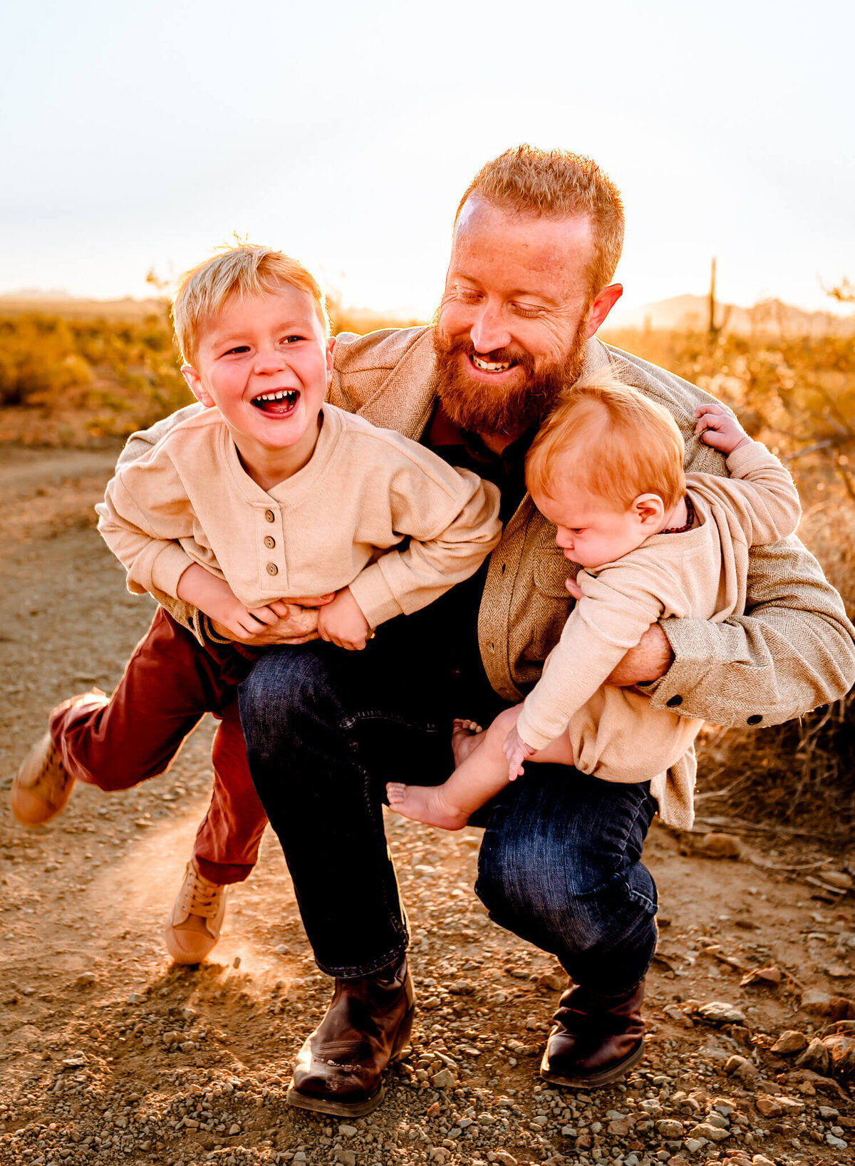 Arizona dad playing with his two sons for family portraits with Cactus & Pine Photography LLC