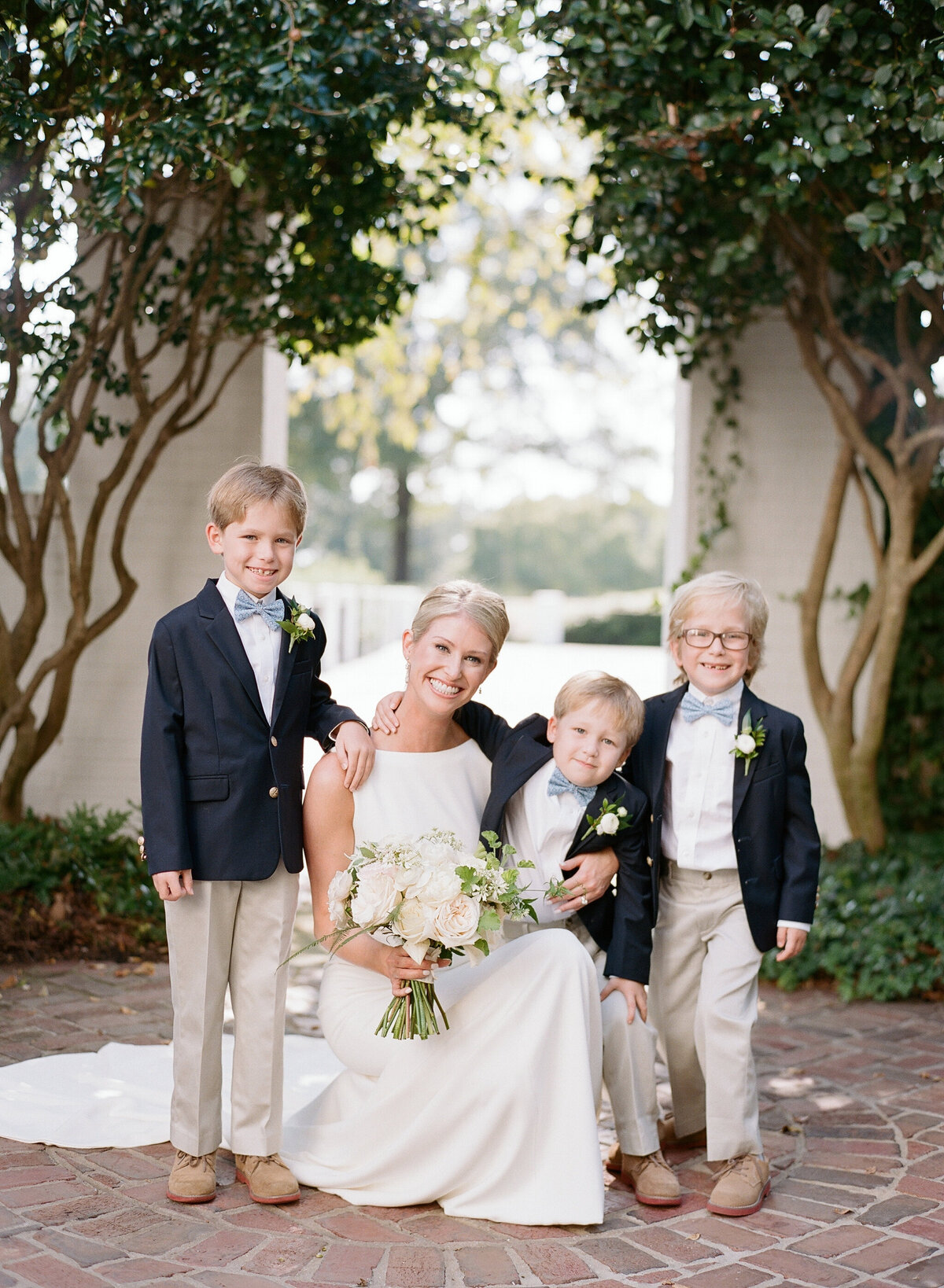 bride with ring bearers at charlotte wedding