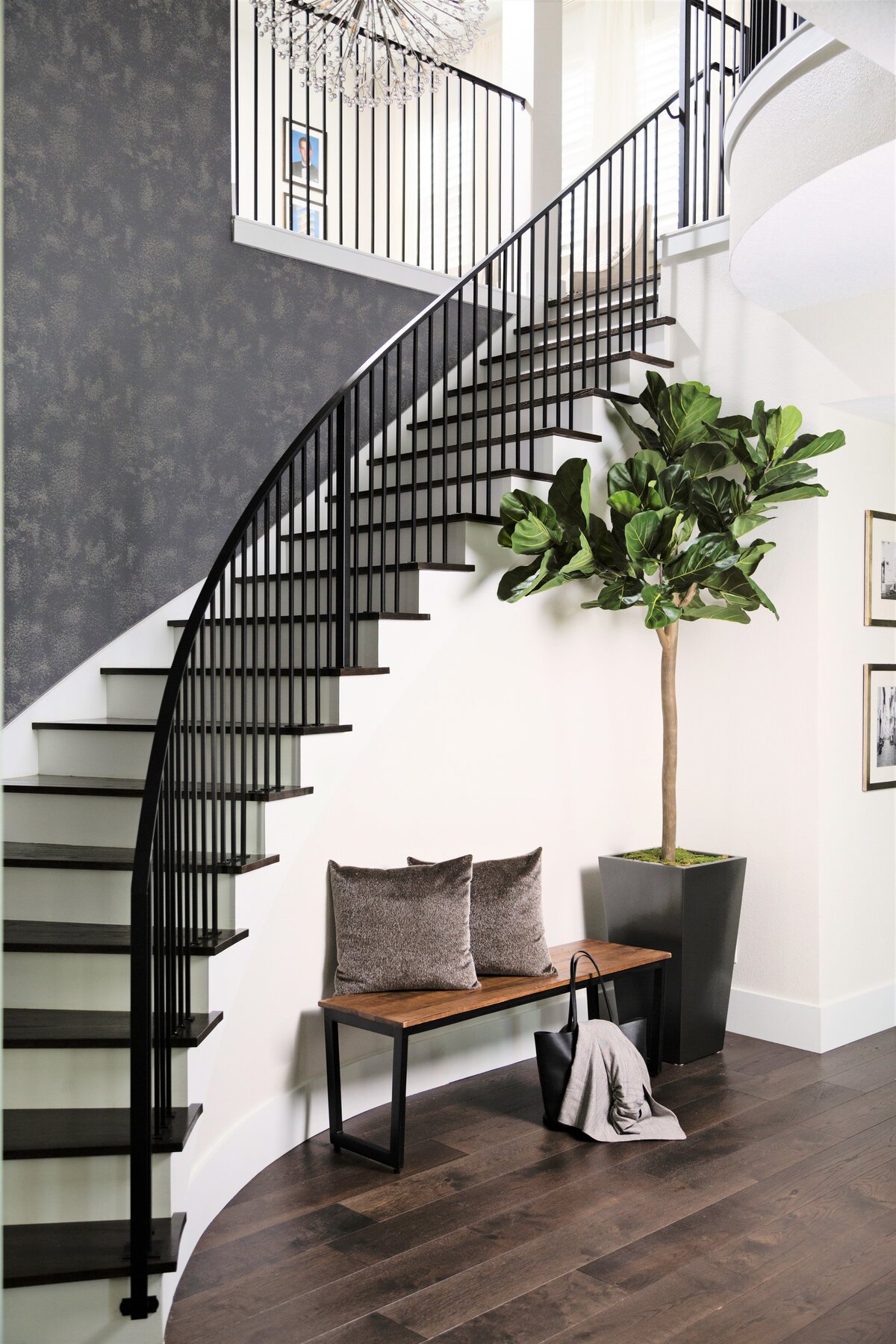 Modern Black Staircase Design with Brown Bench aside