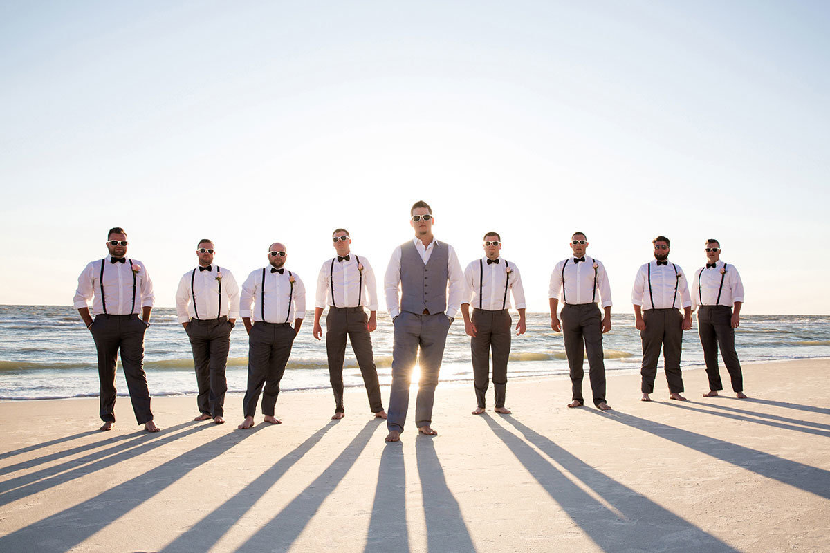 groomsmen on beach laplaya naples wedding