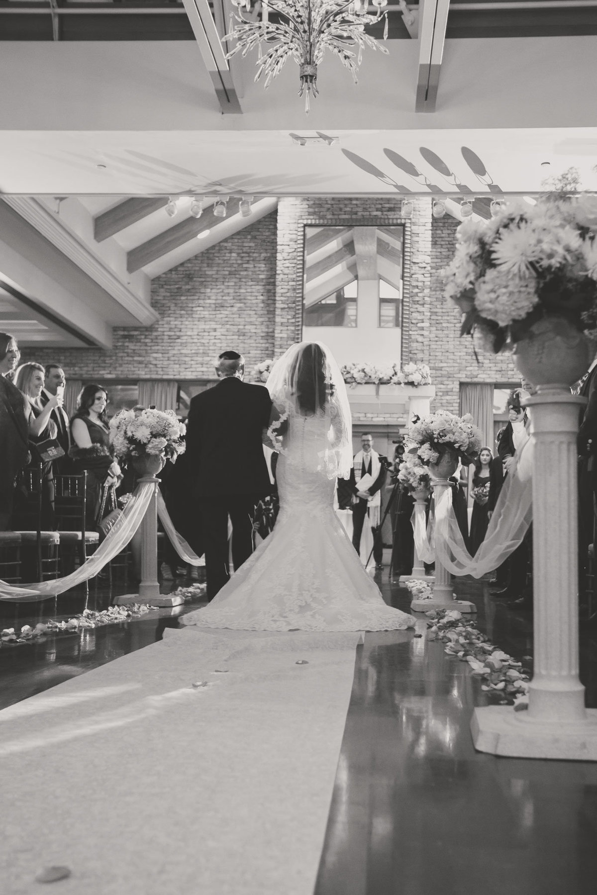 Bride and father walking down the aisle at The Somerley