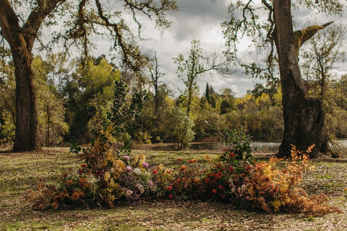 Campovida wedding ceremony ground flowers
