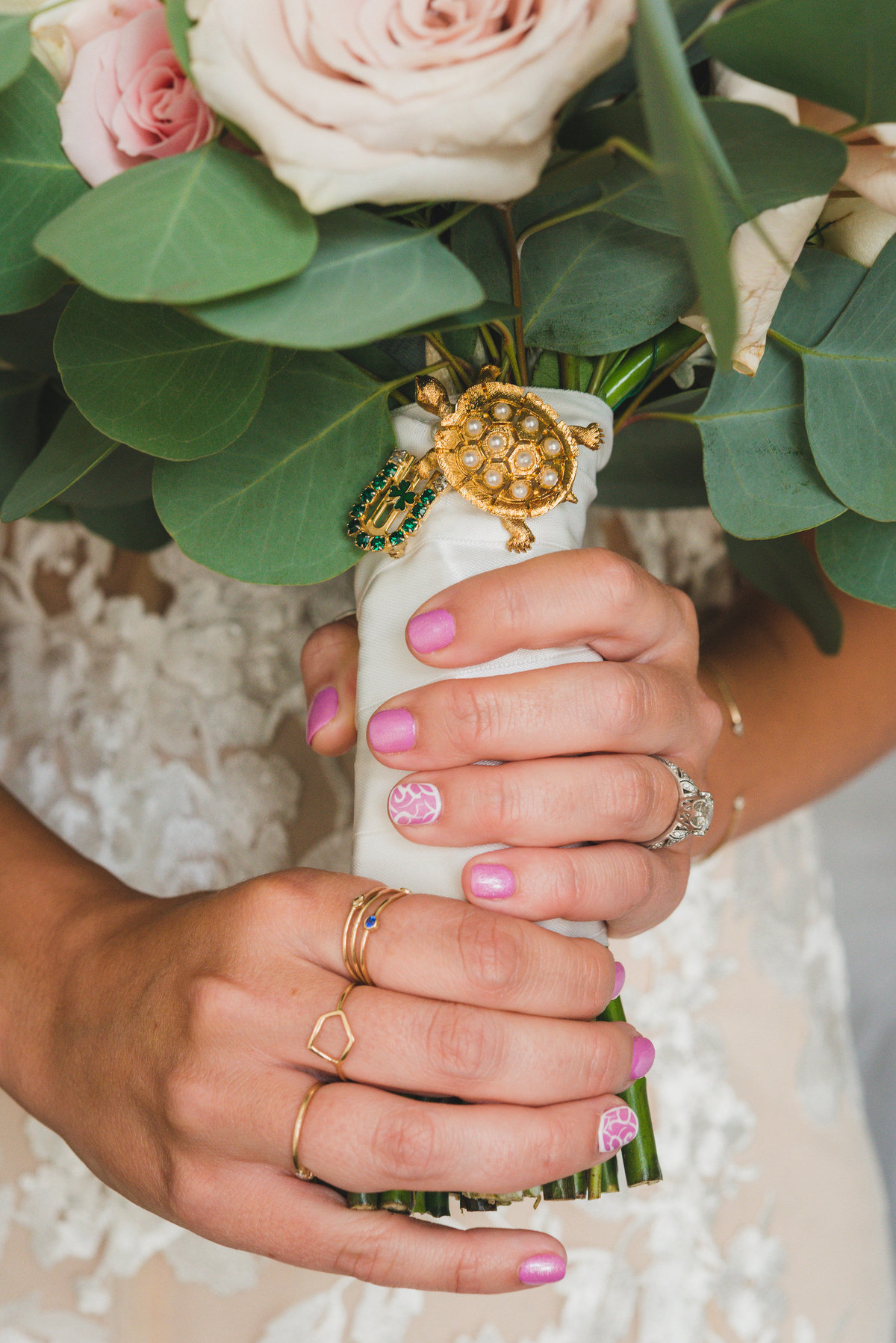 up close of brides hands holding bouquet from wedding at Pavilion at Sunken Meadow