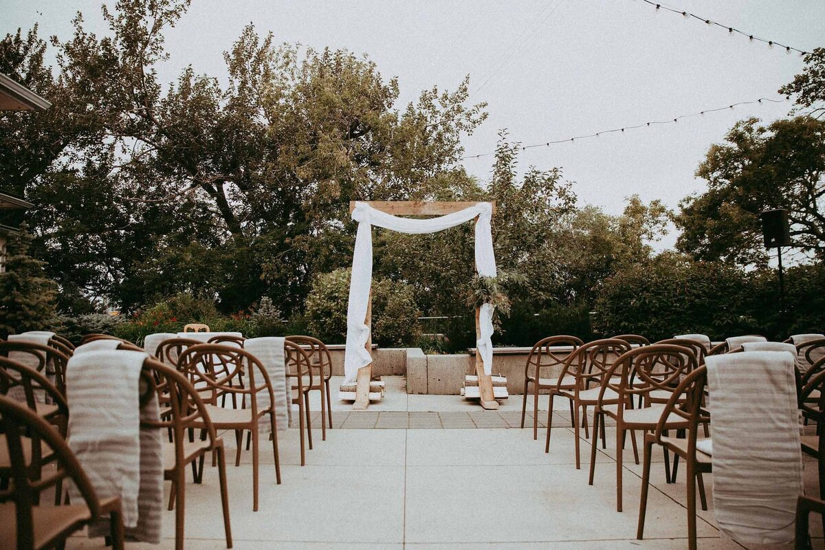 Stunning outdoor ceremony space at Deane House, historical and unique Calgary, Alberta wedding venue, featured on the Brontë Bride Vendor Guide.