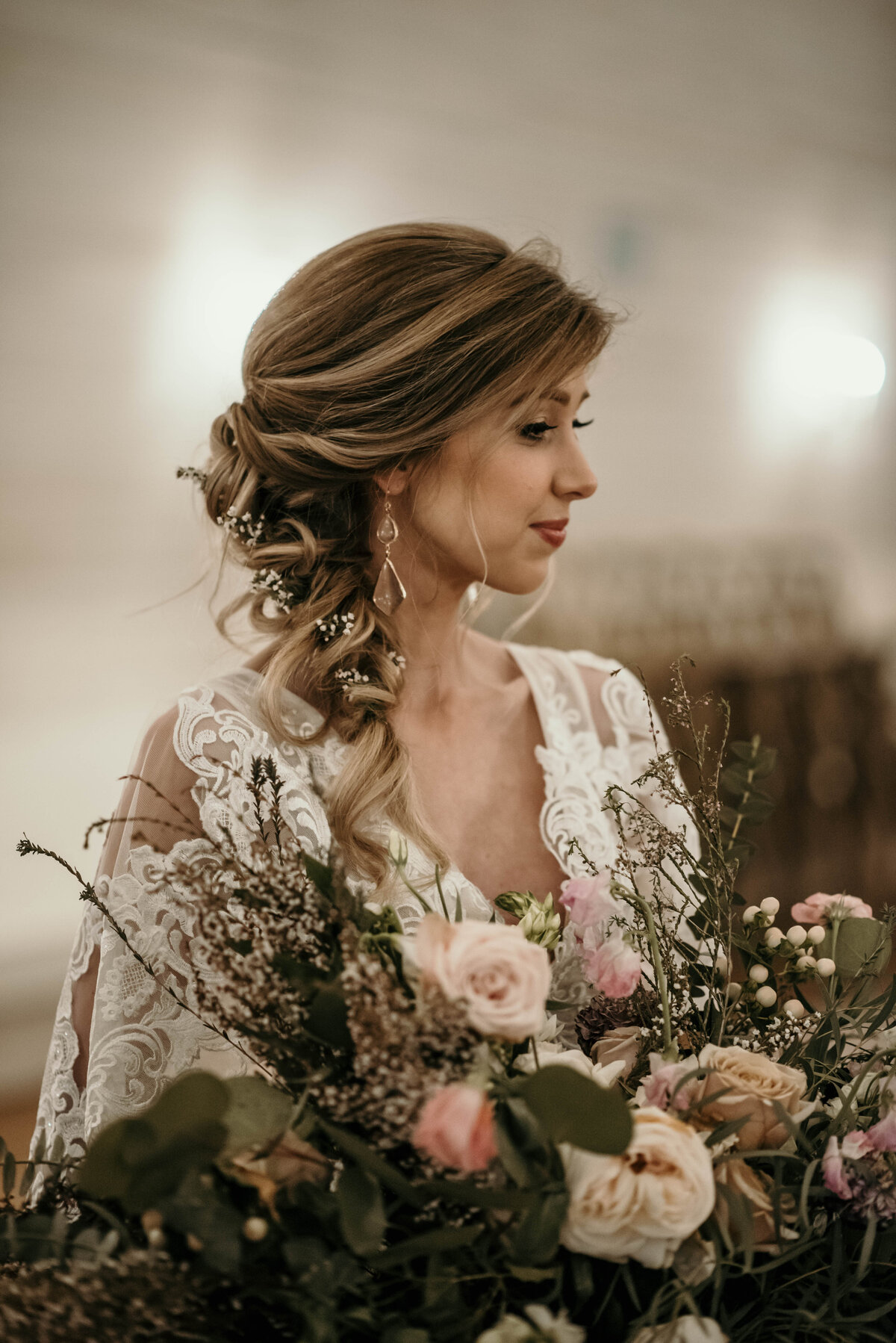 A bride behind her bouquet
