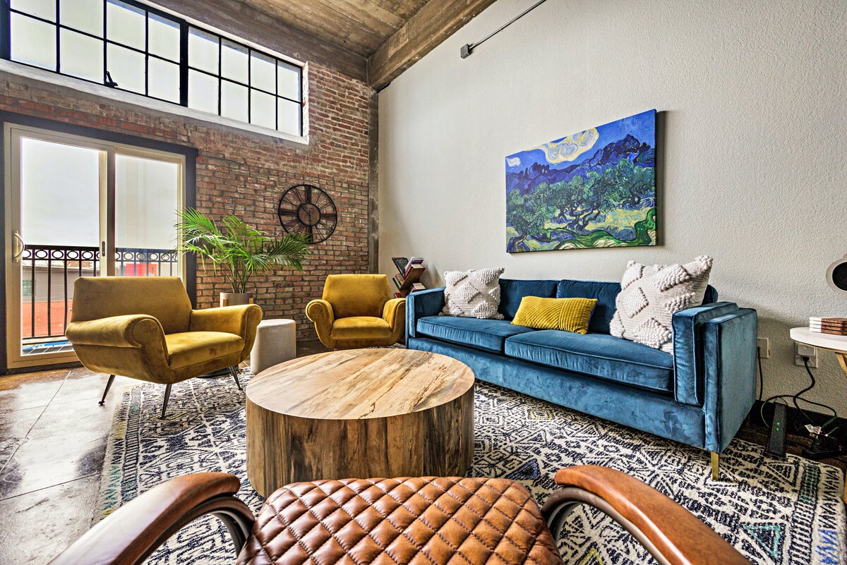 Beautifully decorated living room with MCM vibe in the historic Behrens building in downtown Waco, TX
