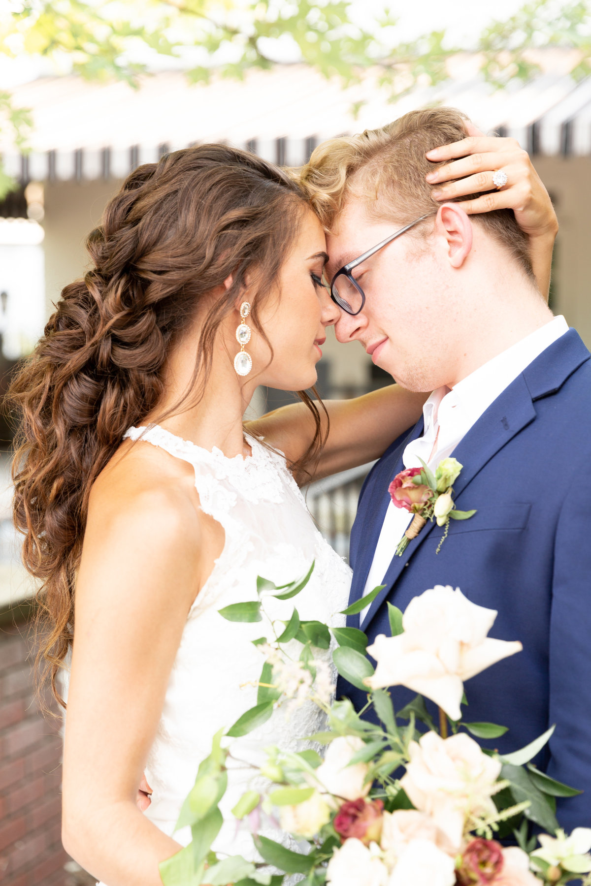 western ny bride and groom touch foreheads with eyes closed