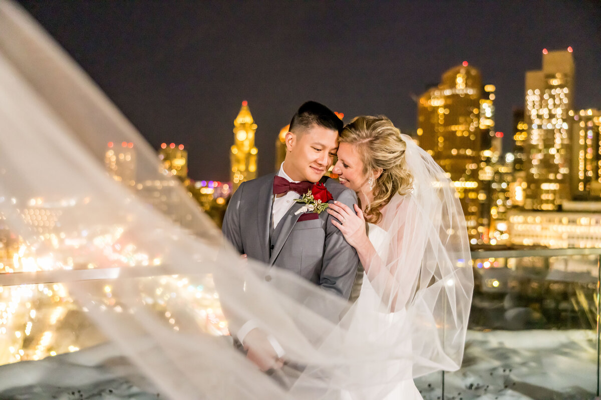 boston skyline wedding photographer couple with veil
