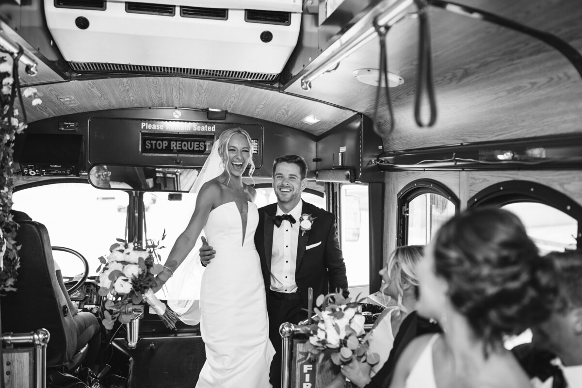 Bride and Groom jumping on Trolley