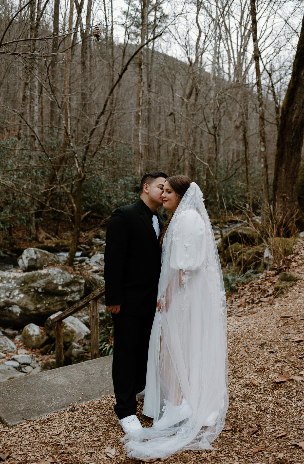 Intimate bride and groom portraits at their Smoky Mountain winter elopement.