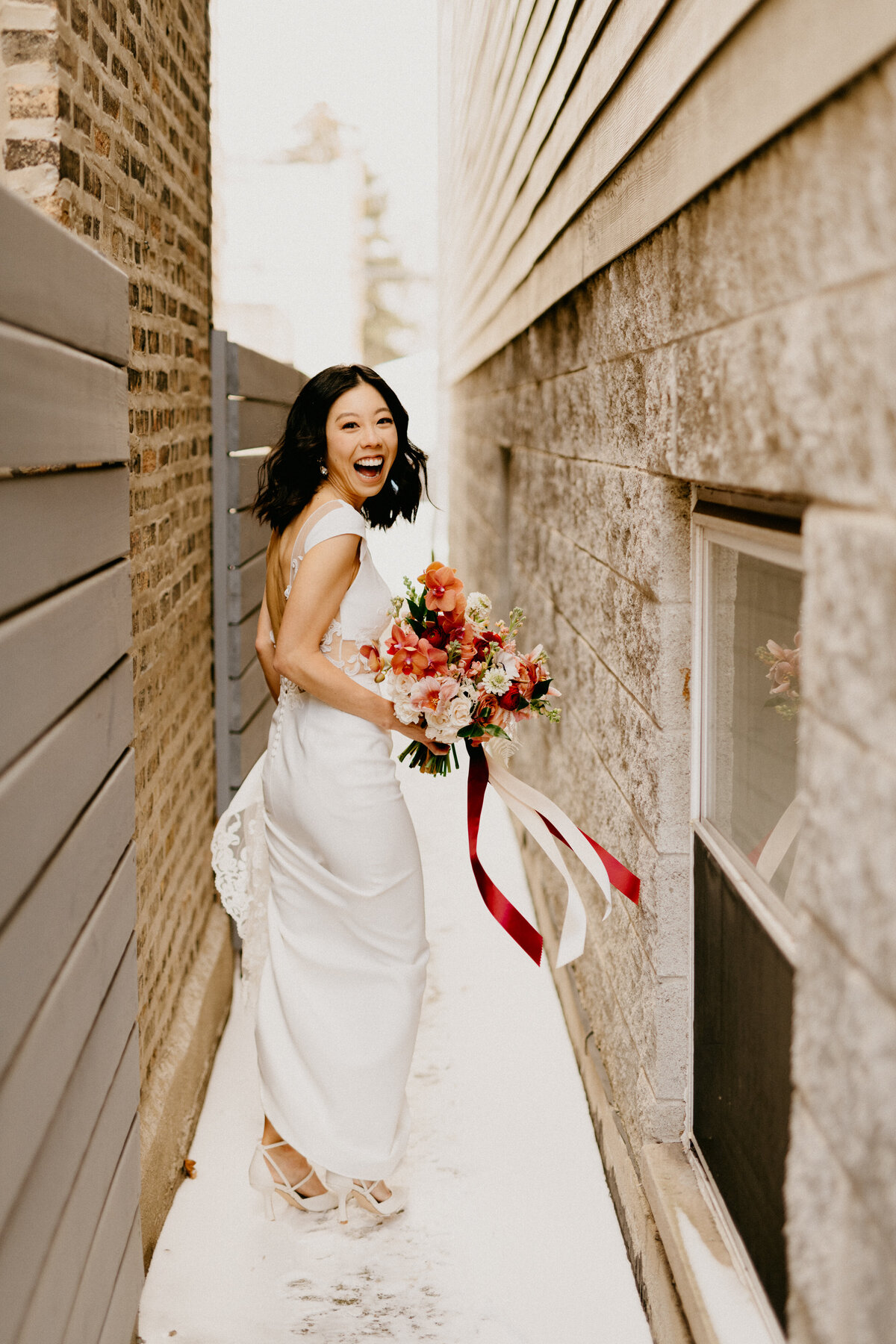 bride smiling near building in chicago