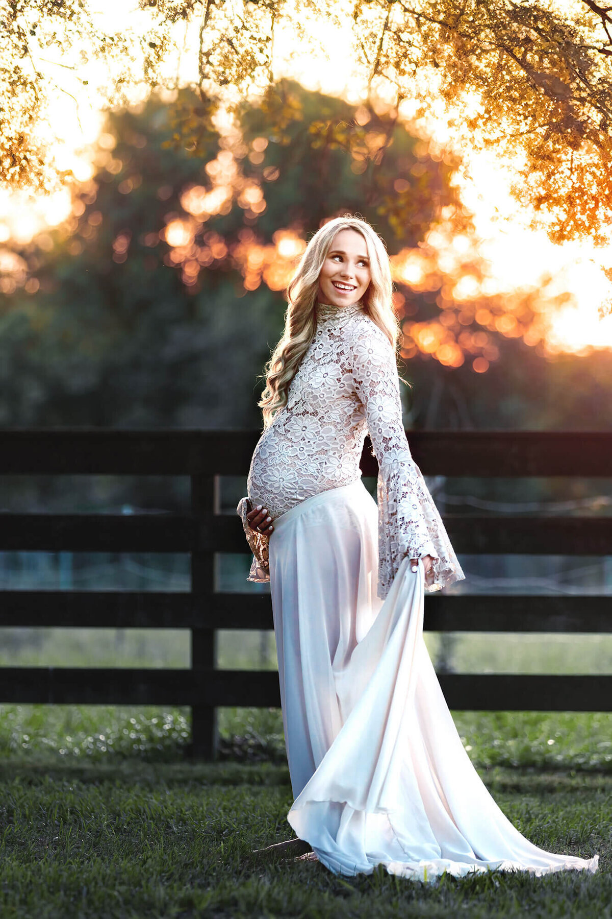 Beautiful mom to be wearing one of the beautiful maternity gowns from Mii-Estilo in Houston, Texas.