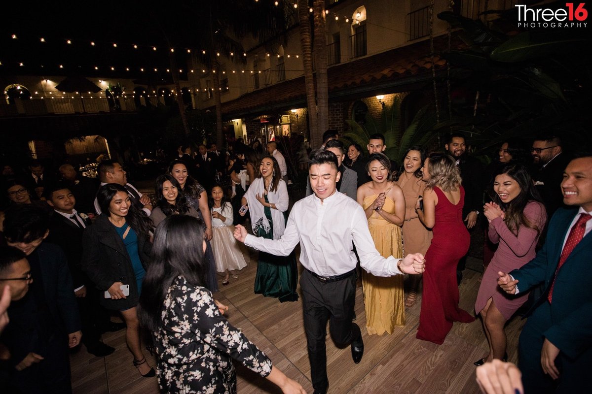Guests dance away the night at a wedding reception