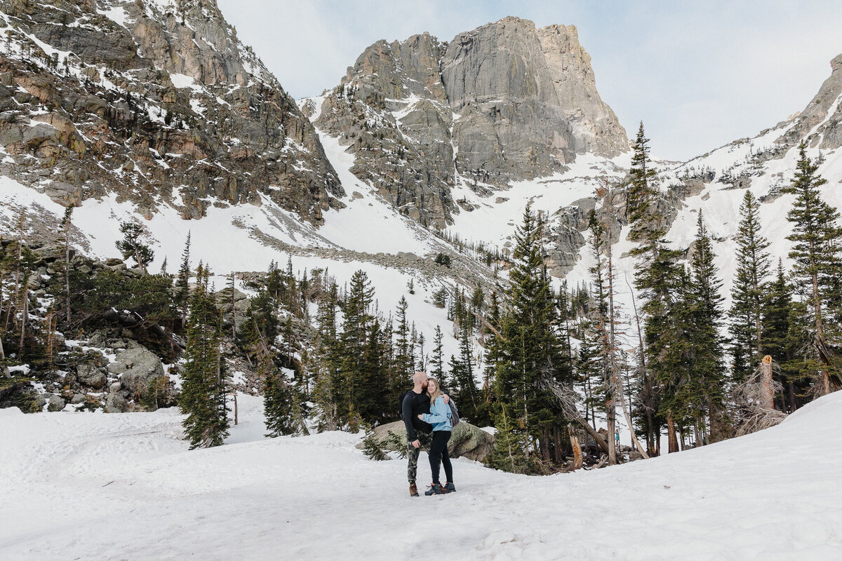 dream lake elopement in Colorado with couple hugging each other