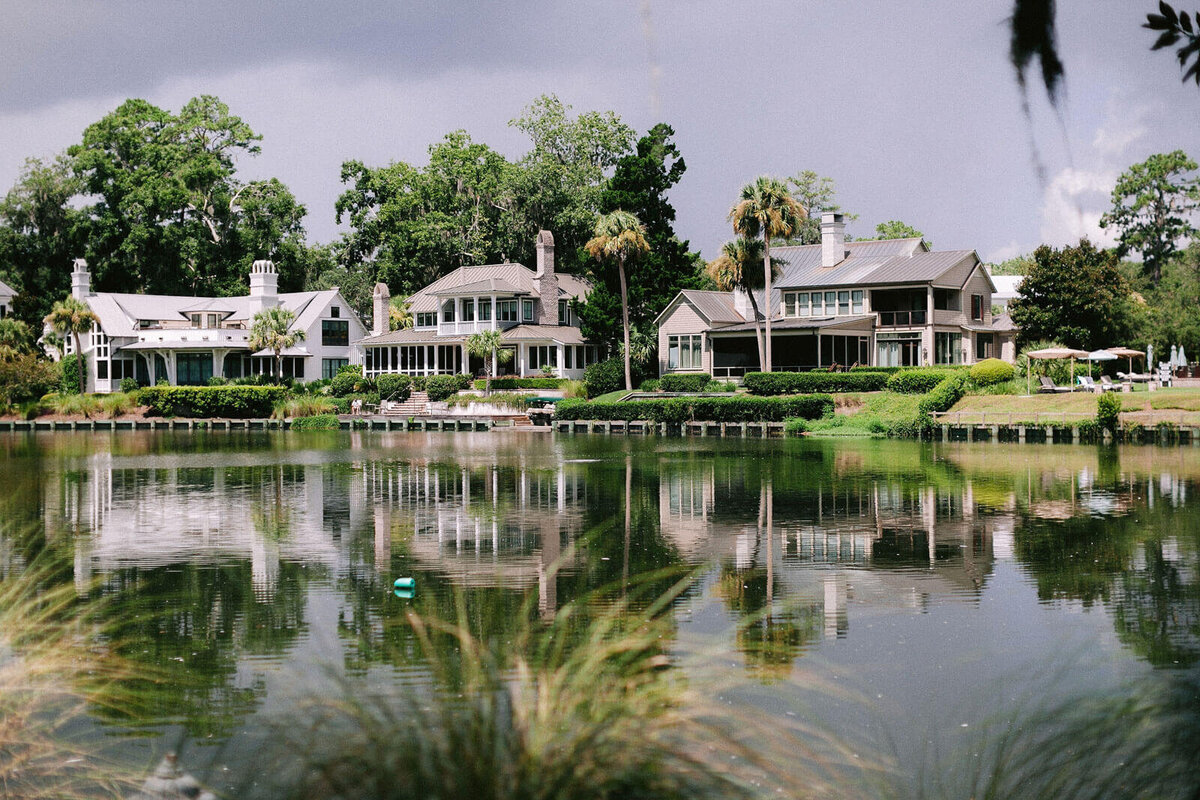 Three beautiful houses fronting a lake in Montage at Palmetto Bluff. Destination wedding image by Jenny Fu Studio