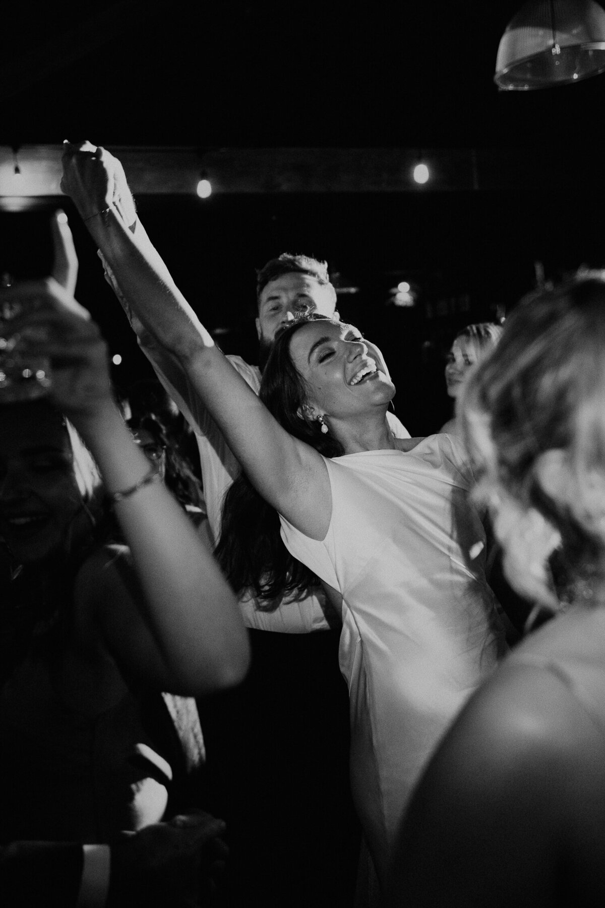 Bride and Groom dance at their wedding at The Stables in Manchester.