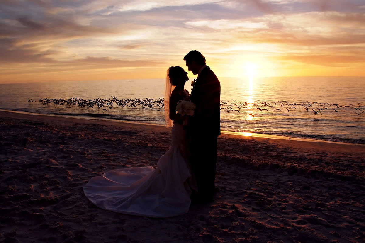 naples beach hotel and golf club sunset wedding