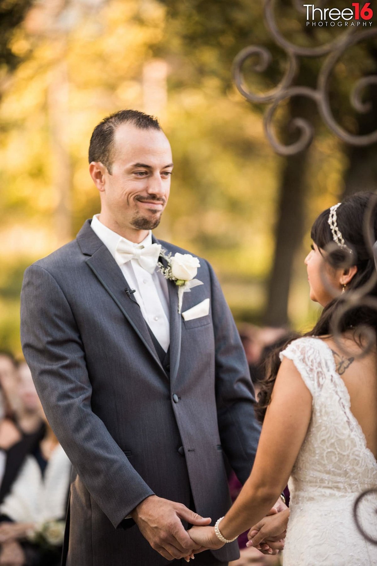 Groom stares at his Bride during the vows