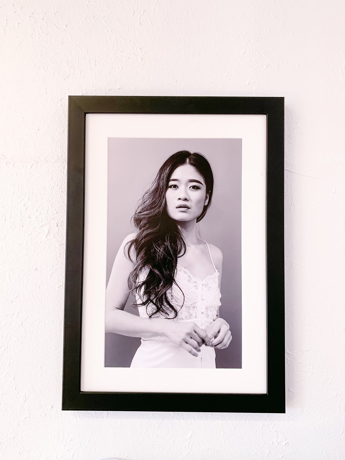 Black Framed print of Asian Woman