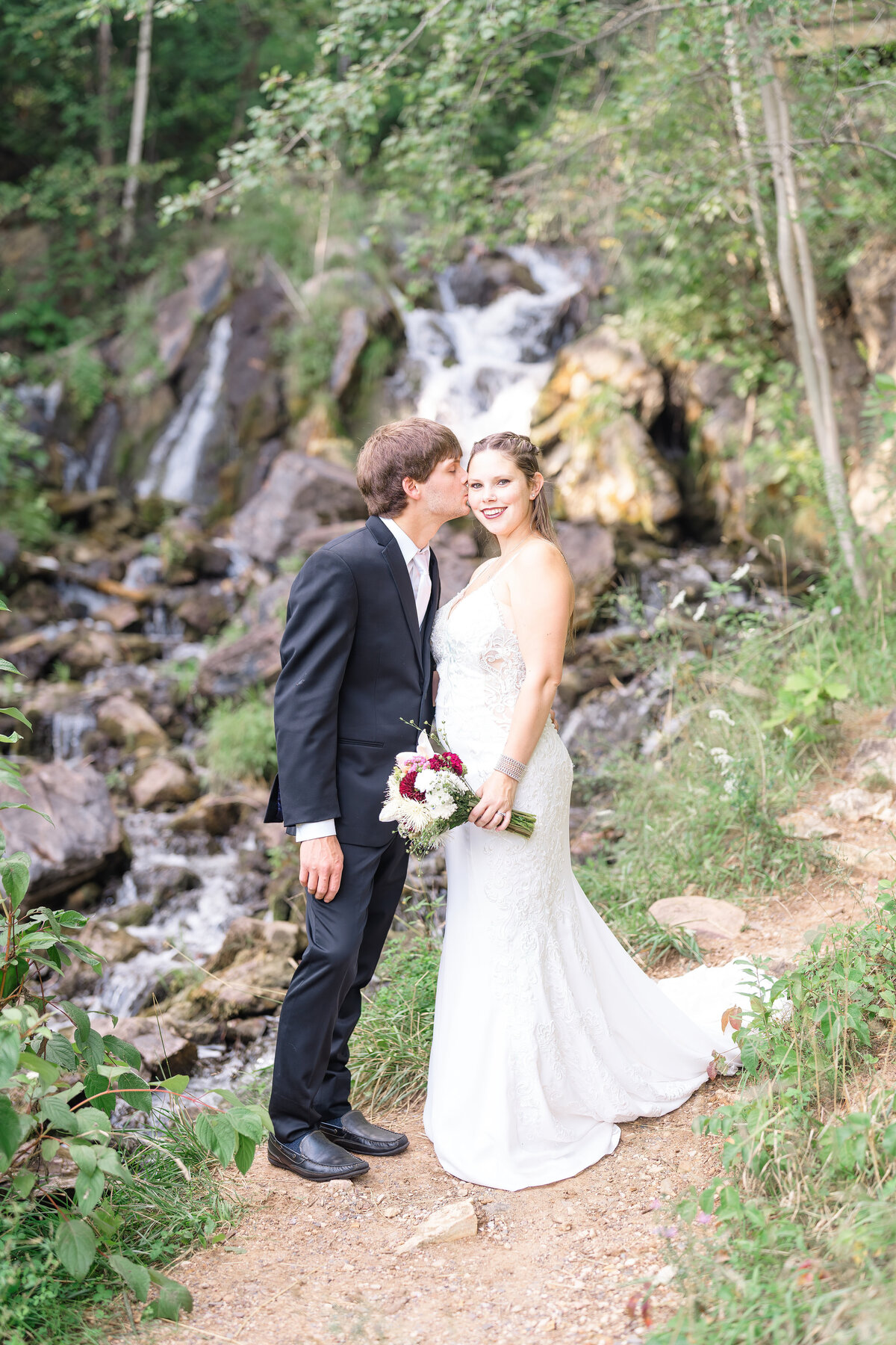 wedding photos at waterfall in iron mountain michigan