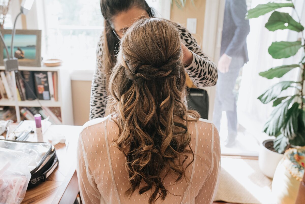 Classic half up hair and makeup by Bellamore Beauty, feminine Calgary hair and makeup artist, featured on the Brontë Bride Vendor Guide.