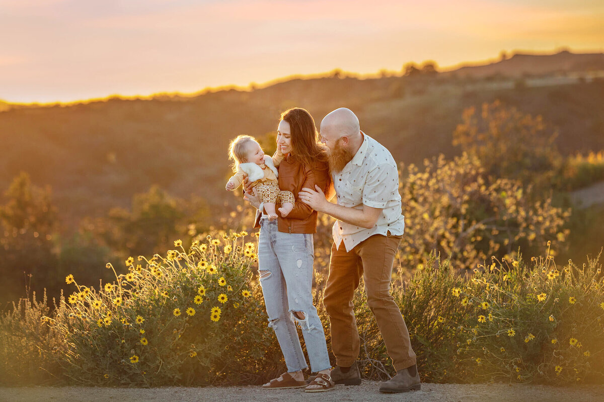 Los Angeles sunset with family of 3 laughing photographed by LA photographer