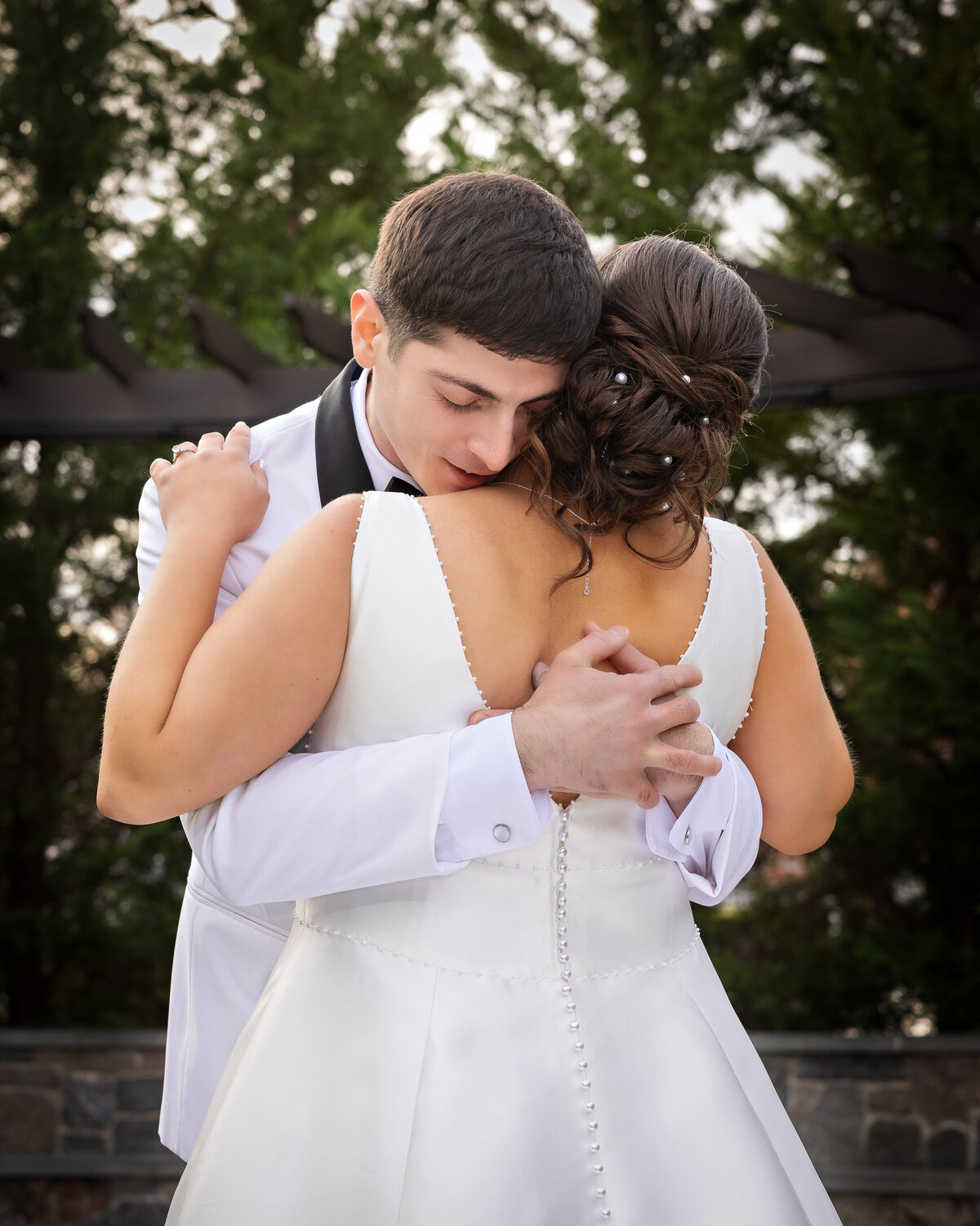 bride-groom-hugging-first-look-davids-country-inn-nj