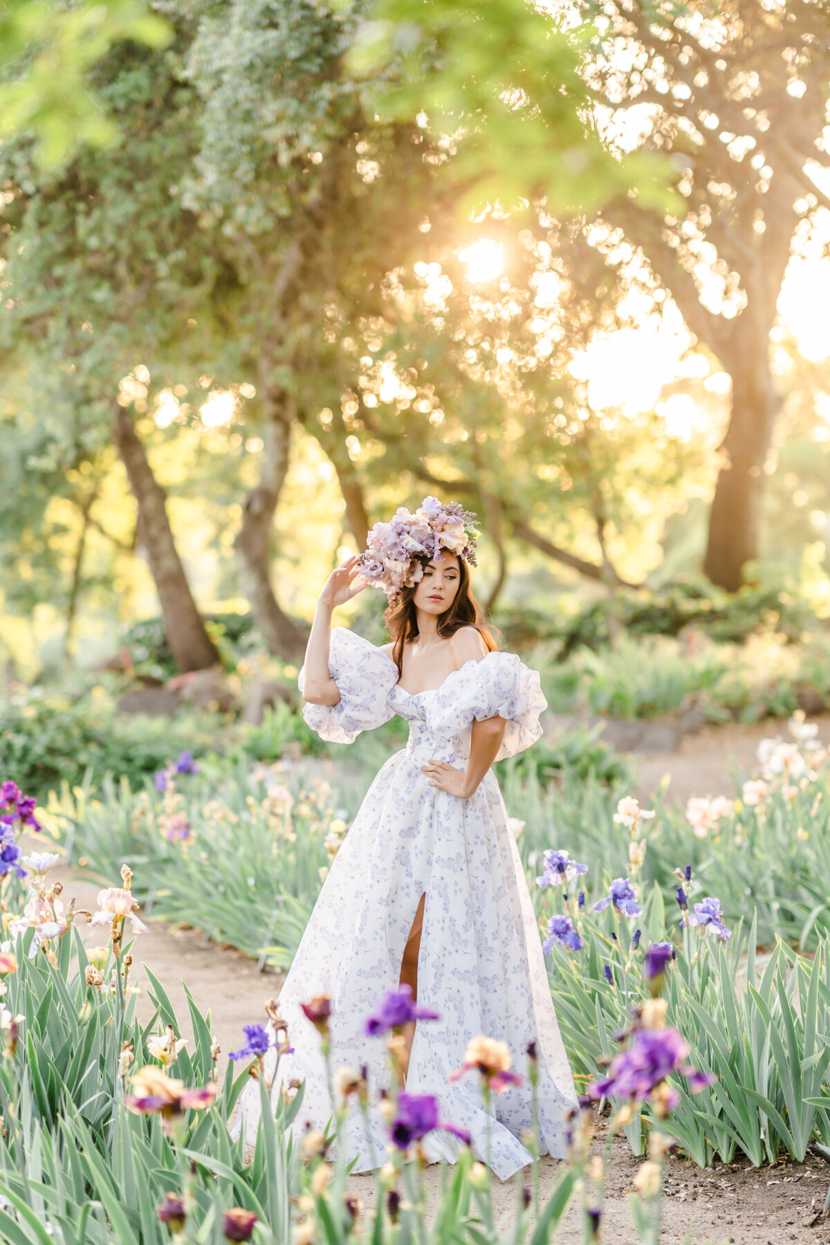 A portrait session photographed by Bay Area Photographer, Light Livin Photography shows a woman posing in a field of lupine flowers.