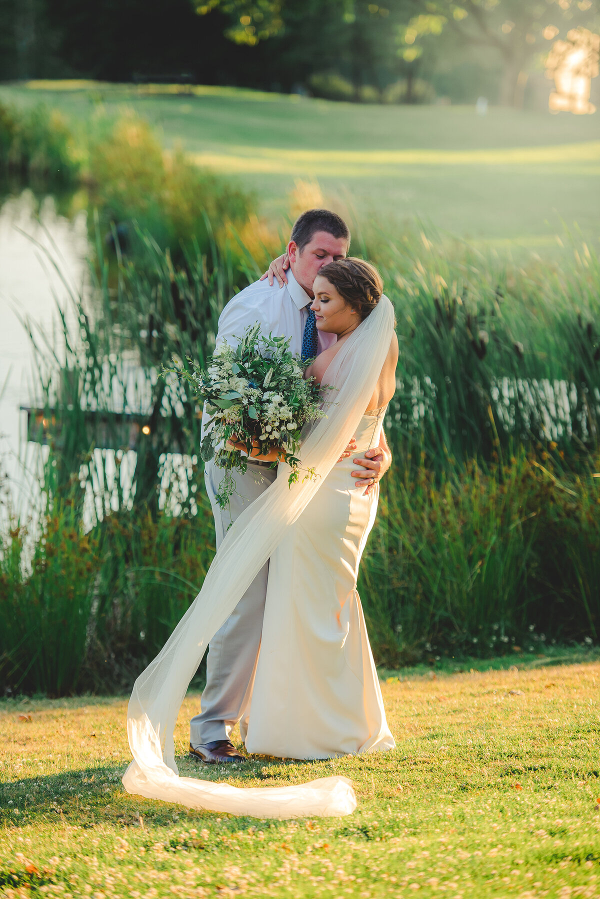 bride and groom posing during golden hour