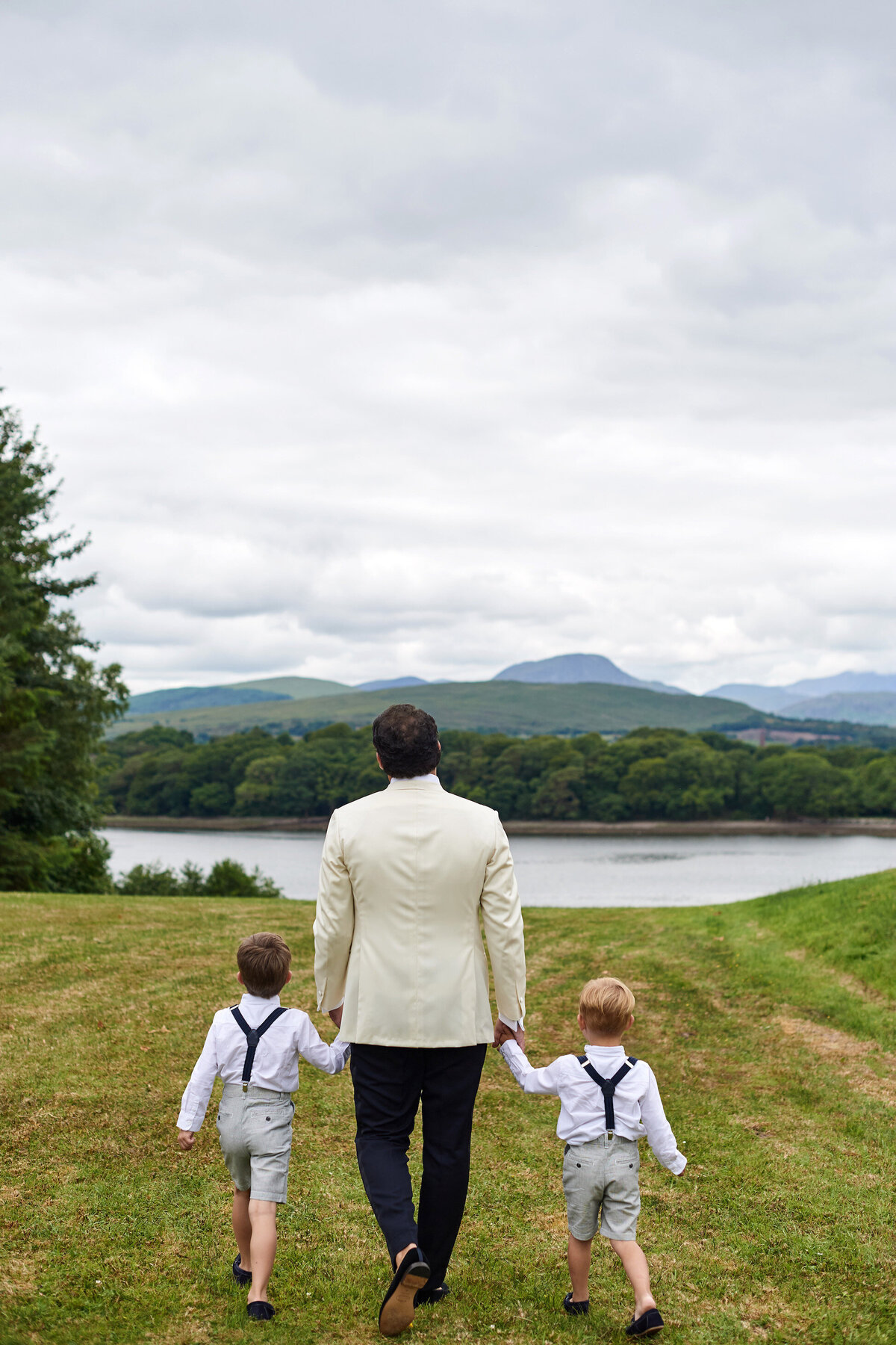 Groom Walking with Kids Sheen Falls Lodge Wedding